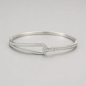 Silver bracelet Crystal Maze Sterling Bracelet - TM & CO. JEWELS - with small stones on a light gray background.