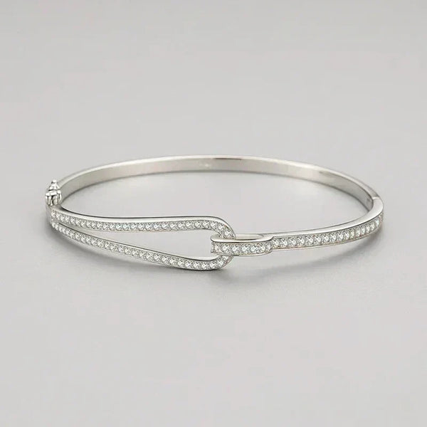 Silver bracelet Crystal Maze Sterling Bracelet - TM & CO. JEWELS - with small stones on a light gray background.