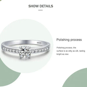 925 sterling silver ring with synthetic cubic zirconia stones and brilliant solitaire design.