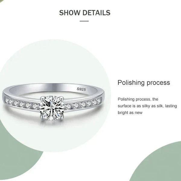 925 sterling silver ring with synthetic cubic zirconia stones and brilliant solitaire design.