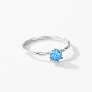 Ocean Dreams Silver Ring - TM & Co. Jewels, with a blue gemstone on a plain background.