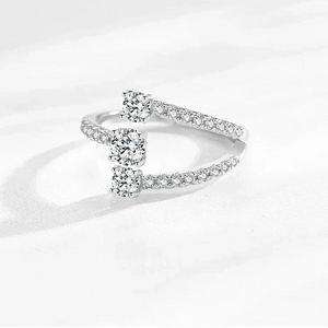 Elegant sterling silver ring with sparkling round and rectangular cubic zirconia stones