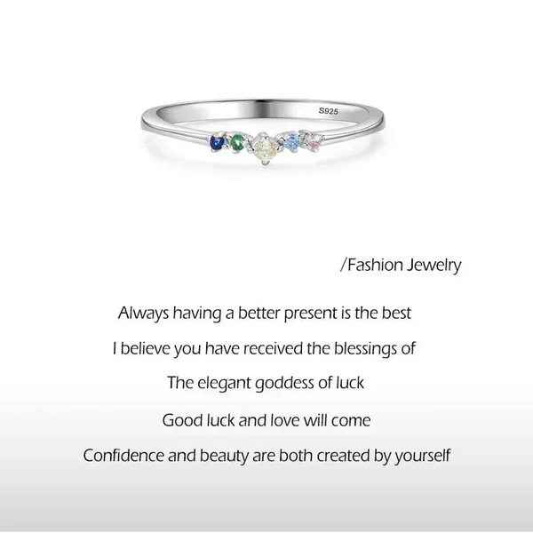 Prism Glow Stackable Ring - TM & Co. Jewels-Silver ring with multicolored gemstones on a light gray background.
