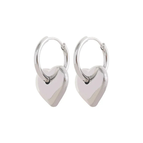 Astral Affection Hoops - TM & CO. JEWELS - Pair of gold hoop earrings on a white background.