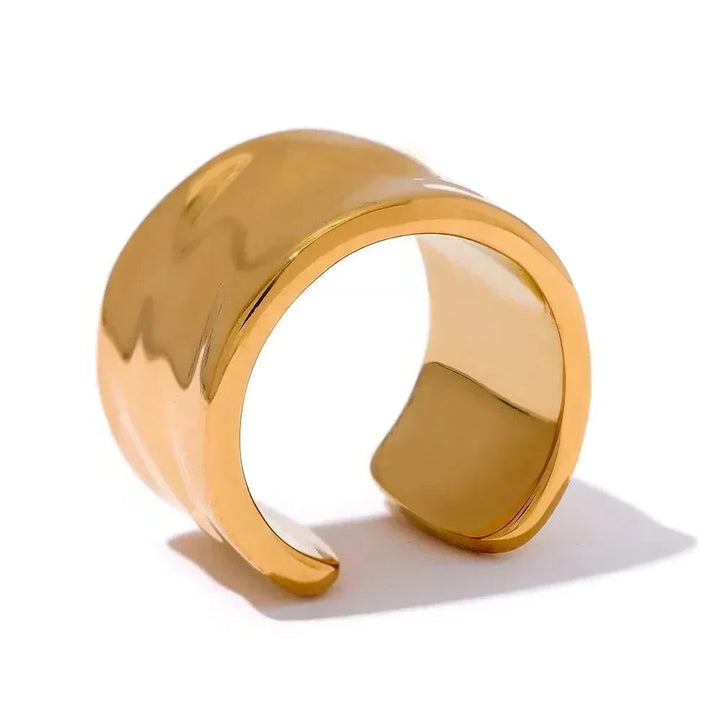 Gold ring on a white background
