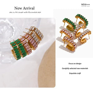 Gold and green earrings on a white background with 'New Arrival' text.