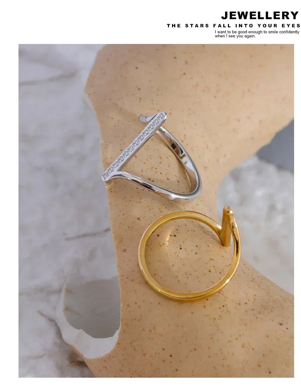 Minimalist 925 silver and 18K gold-plated rings displayed on a textured surface