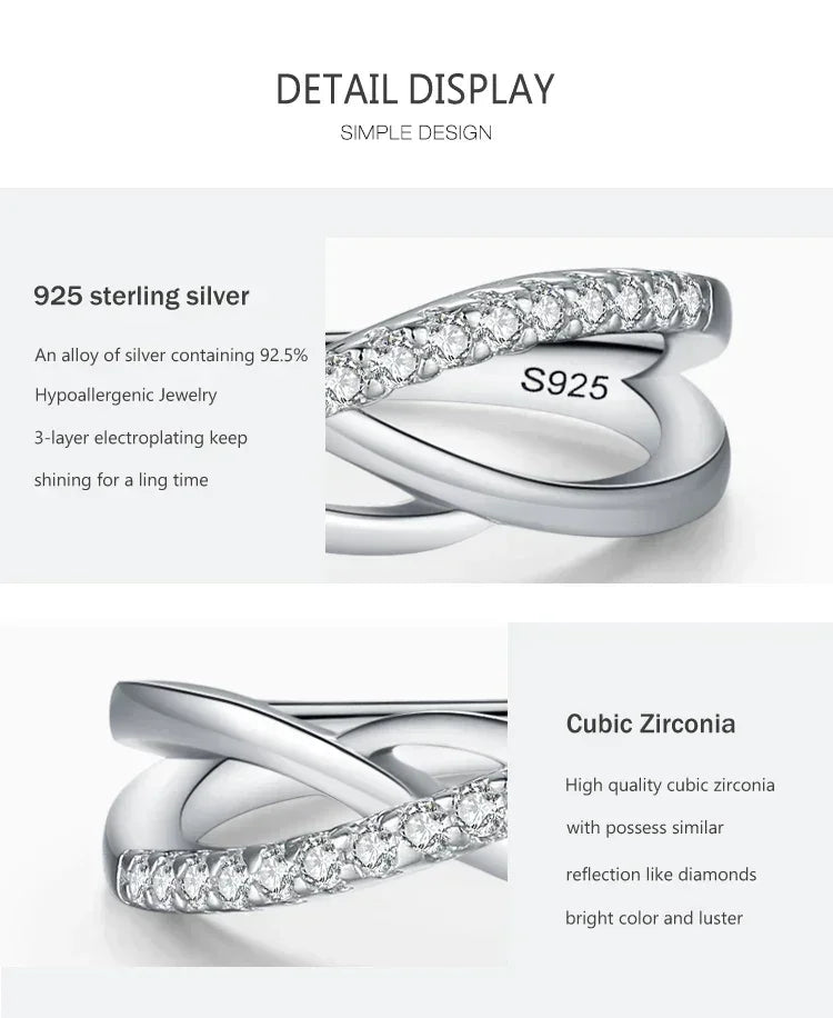 Close-up of a 925 sterling silver ring with cubic zirconia stones, simple elegant design.