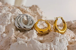 925 silver and 18K gold-plated chunky hoop earrings on textured stone