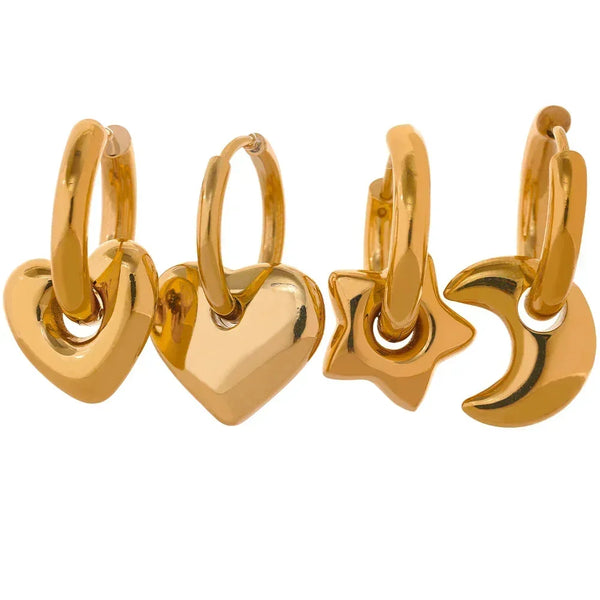 Set of gold hoop earrings with heart, star, and crescent moon designs on a white background.