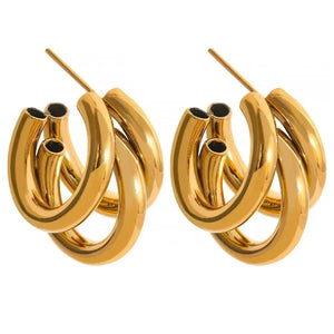 Chunky triple hoop gold-plated statement earrings for women on white background