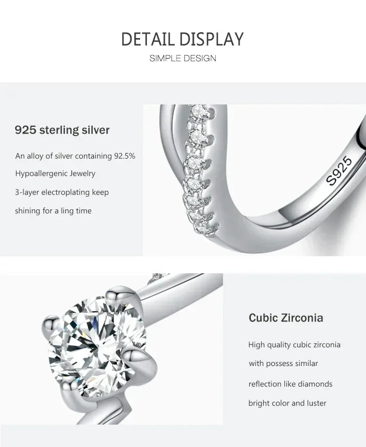 Close-up of a 925 sterling silver ring with cubic zirconia stones, showing detailed design and high luster.