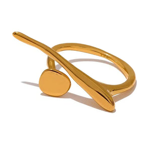 Gold bracelet with a circular design on a white background