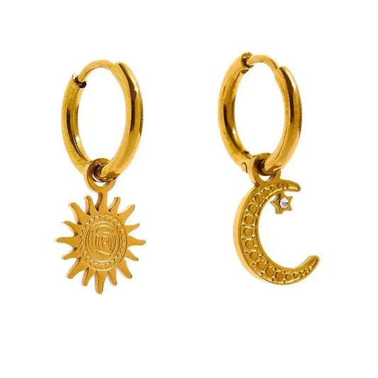 Gold-plated hoop earrings with sun and moon charms, celestial jewelry design
