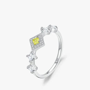 Silver ring with a yellow gemstone on a white background-TM & CO. JEWELS 