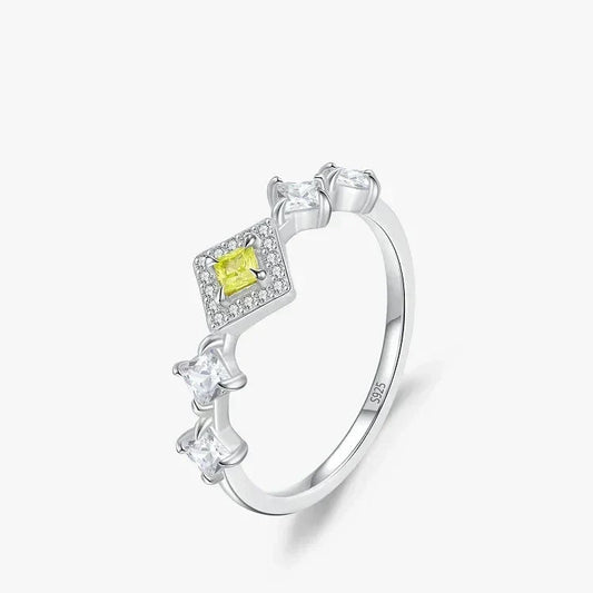 Silver ring with a yellow gemstone on a white background-TM & CO. JEWELS 