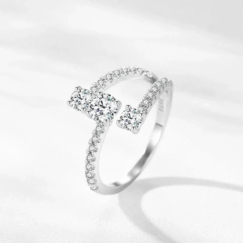 Elegant sterling silver ring with sparkling round and rectangular cubic zirconia stones