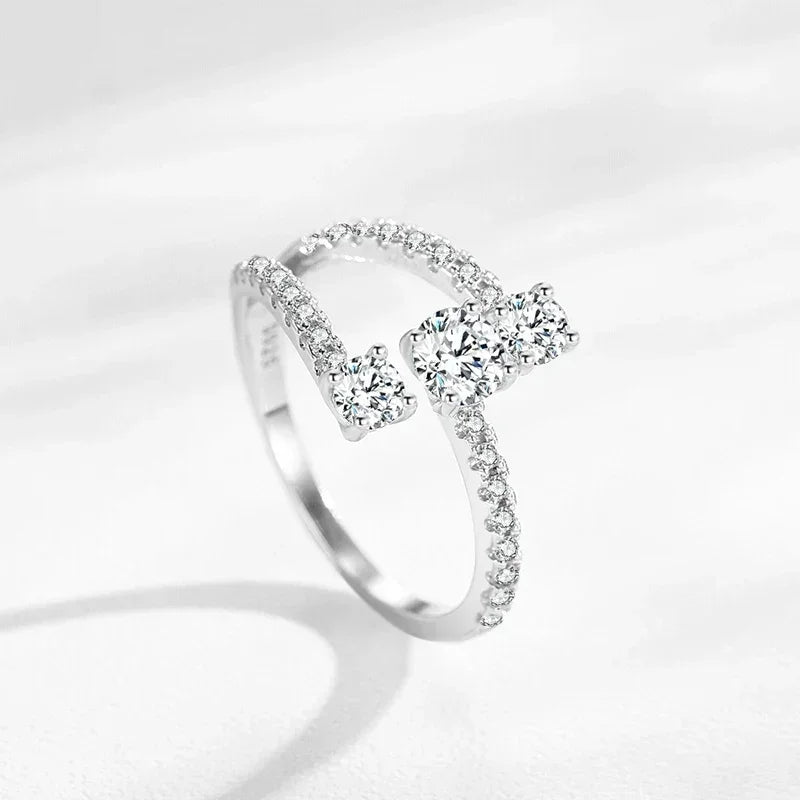 Elegant 925 silver open band ring with sparkling round cubic zirconia accents
