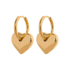 Astral Affection Hoops - TM & CO. JEWELS - Pair of gold hoop earrings on a white background.