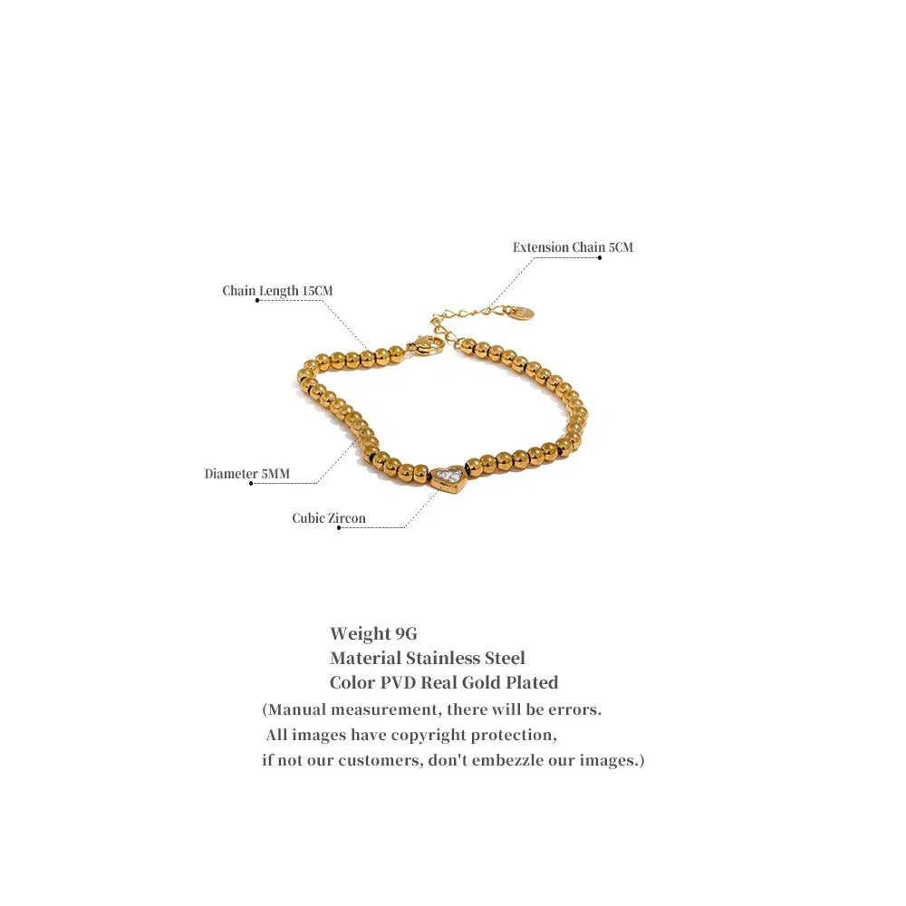 Gold-plated stainless steel beaded bracelet with cubic zirconia heart charm, 15cm chain length