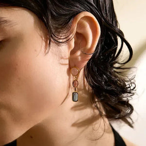 Elegant 18K gold-plated dangle earrings with gemstone accents, perfect for everyday style.