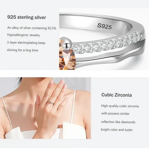 Silver ring with cubic zirconia stones on a white background