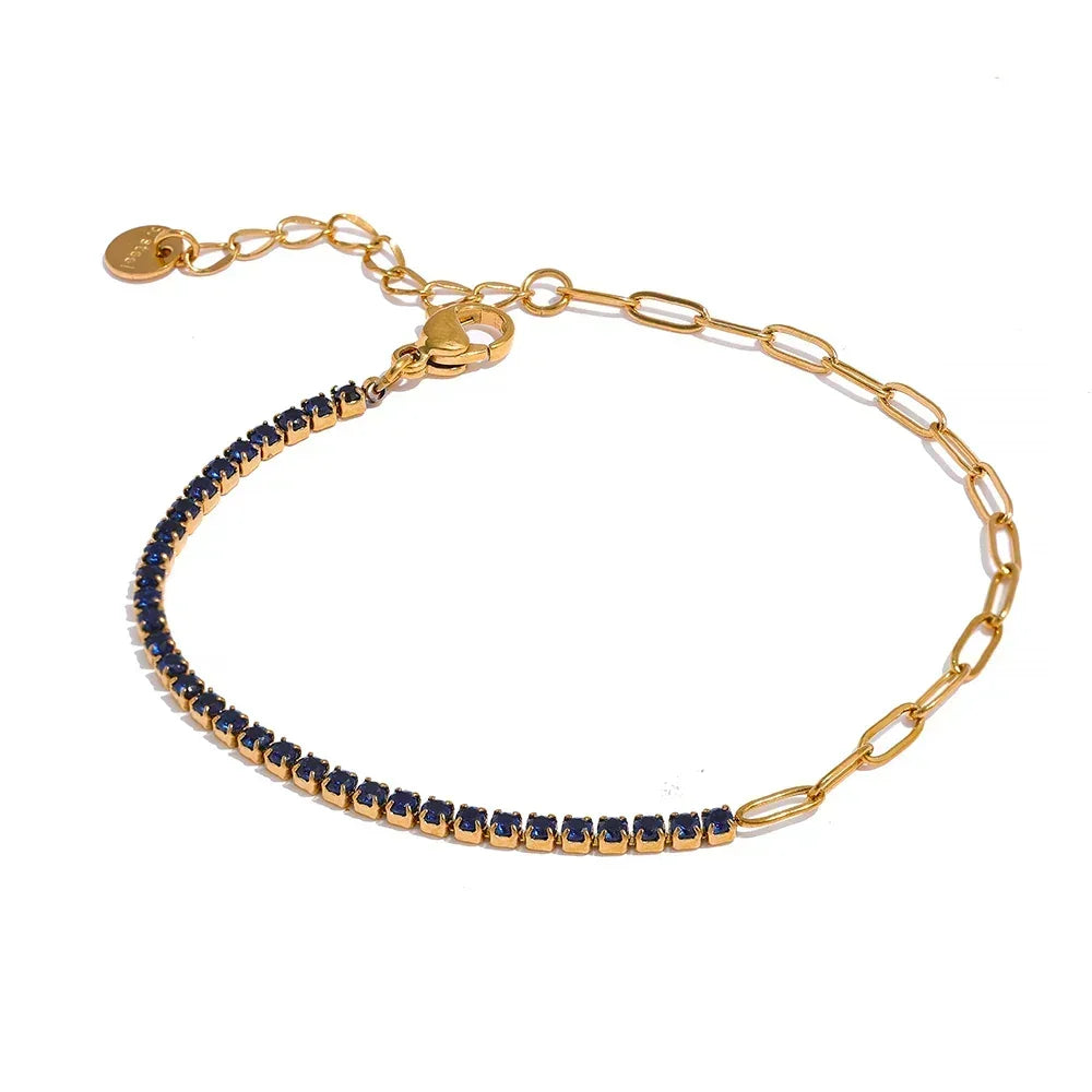 18K gold-plated bracelet with dark blue stones and adjustable chain on white background