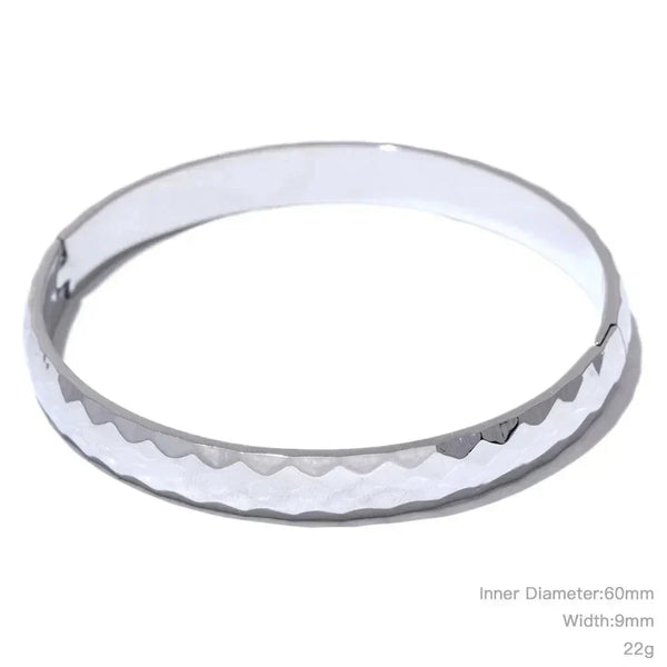 steel bangle bracelet with hammered texture, 60mm diameter, 9mm wide