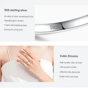 Pure Emerald CZ Ring - TM & Co. Jewels- Silver ring with '925' stamp and cubic zirconia on a white background.