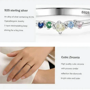 Prism Glow Stackable Ring - TM & Co. Jewels-Silver ring with colorful gemstones on a white background, featuring text about 925 sterling silver and cubic zirconia.