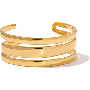 Gold bracelet on a white background