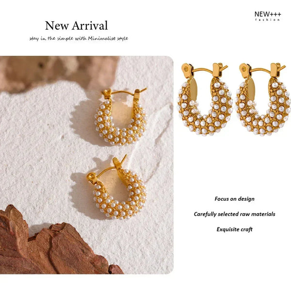 Gold hoop earrings with pearl detailing on a textured surface, labeled 'New Arrival' by NEW++ Fashion.