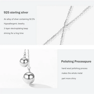 Silver necklace with 925 sterling silver details on a white background