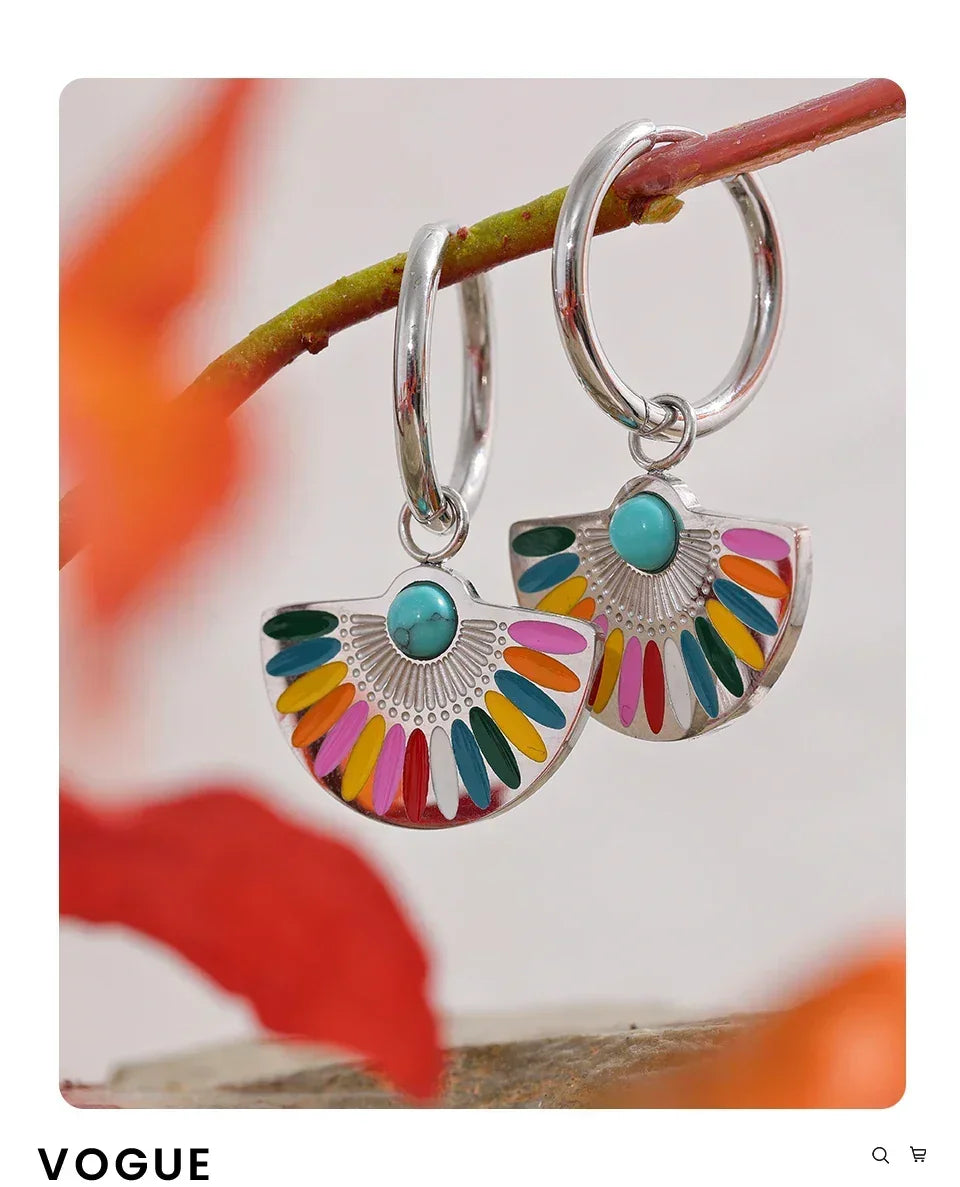 Colorful enamel and turquoise fan-shaped 925 silver hoop earrings on a branch