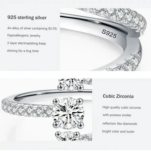 Close-up of a 925 sterling silver ring with cubic zirconia stones and S925 stamp detail.