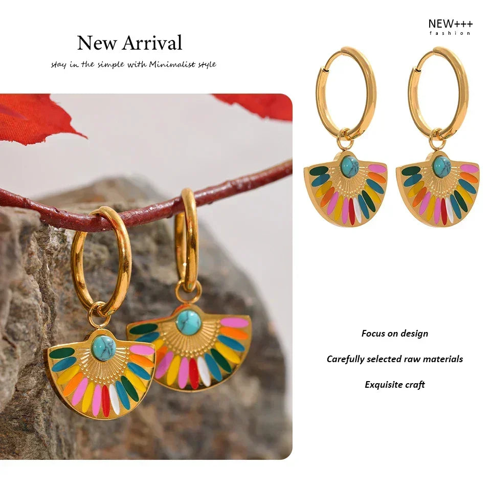 Gold hoop earrings with colorful enamel fan-shaped charms and turquoise center stone.