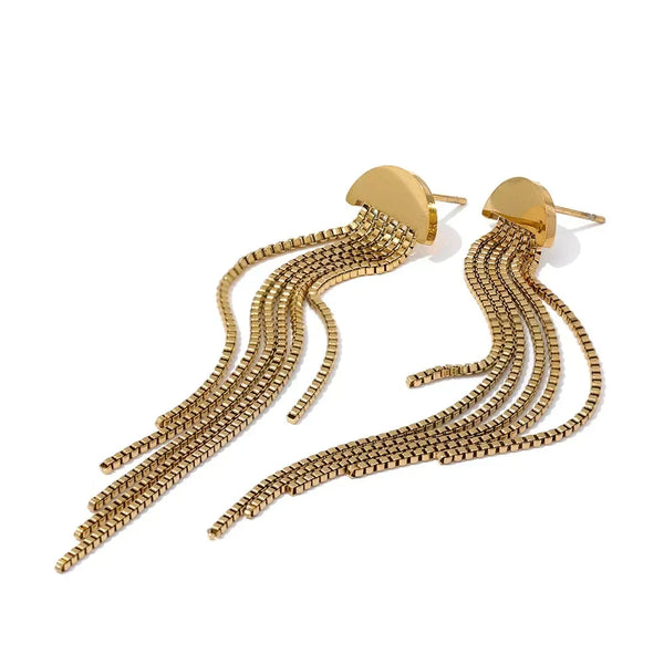 Gold chain tassel earrings on a white background