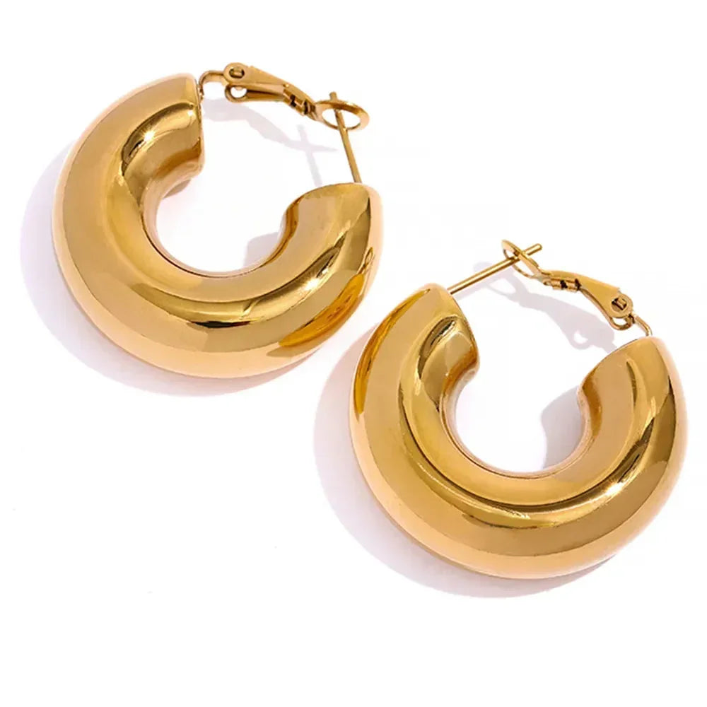 Pair of chunky 18K gold-plated hoop earrings with latch back closures on white background