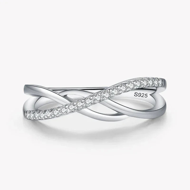 Sterling silver 925 infinity ring with intertwined bands and sparkling crystals