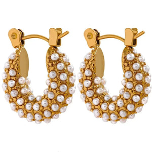 Gold-plated hoop earrings adorned with small white pearls, elegant women's jewelry