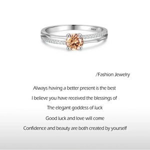 Silver ring with a peach-colored gemstone on a white background, featuring text about design inspiration and jewelry.