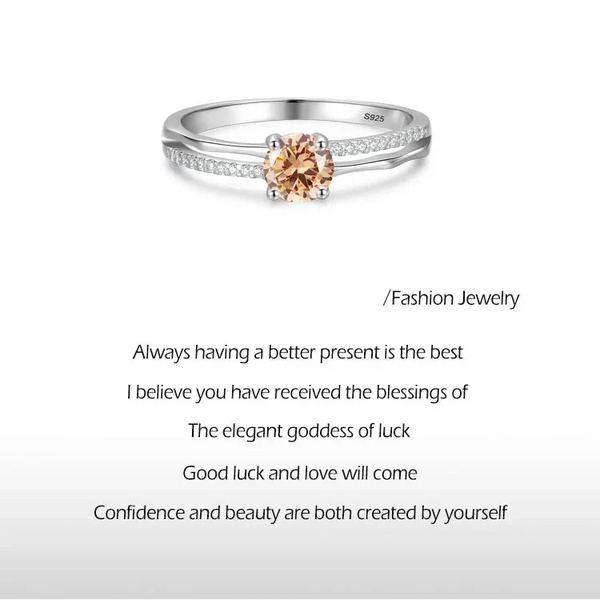 Silver ring with a peach-colored gemstone on a white background, featuring text about design inspiration and jewelry.