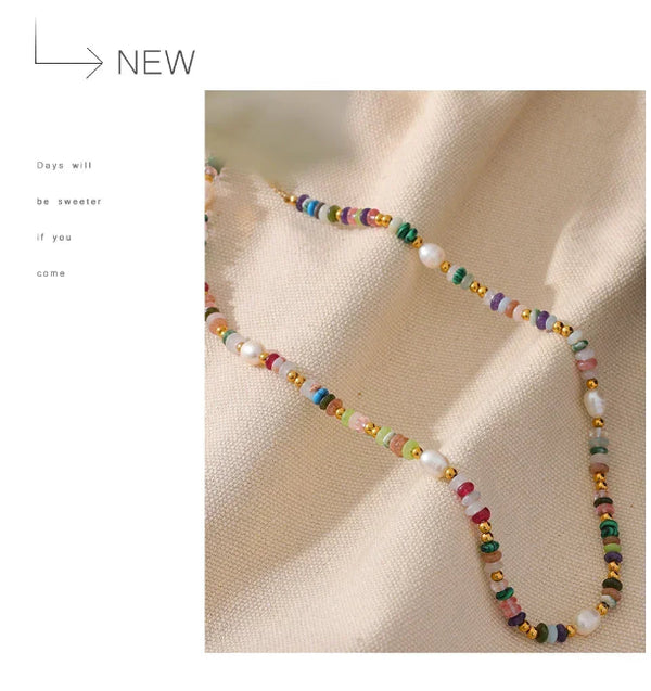Colorful beaded necklace on a beige fabric background with motivational quote.-Nouveau Bohème Necklace - TM & CO. JEWELS 