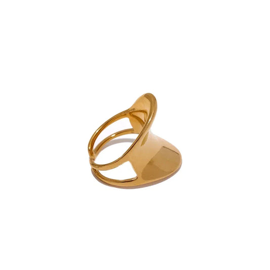 Modern wide band 18K gold-plated ring with unique open design on white background