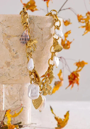 Sbc10f5e297f949a880e80f8e22018f87f_2f763a5c-236c-4af4-b8ba-866198197b37 - TM & CO. JEWELS 