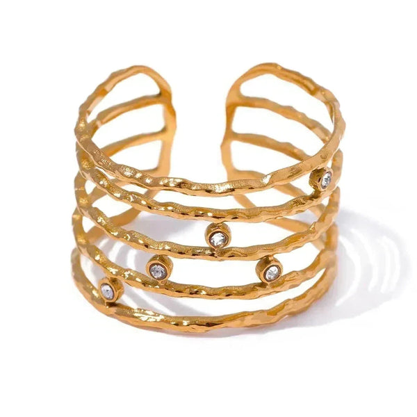 18K gold-plated open cuff ring with textured bands and small gemstone accents