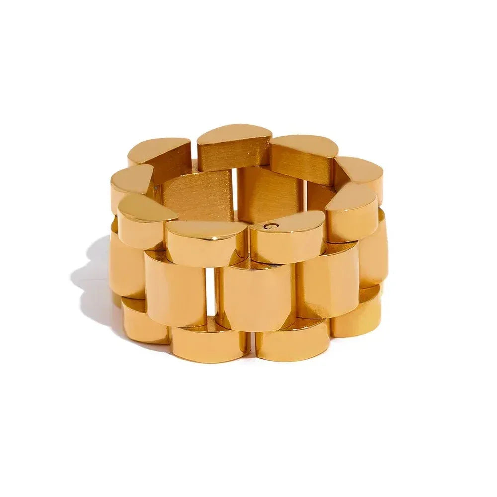 Chunky 18K gold plated geometric ring with modern interlocking design on white background