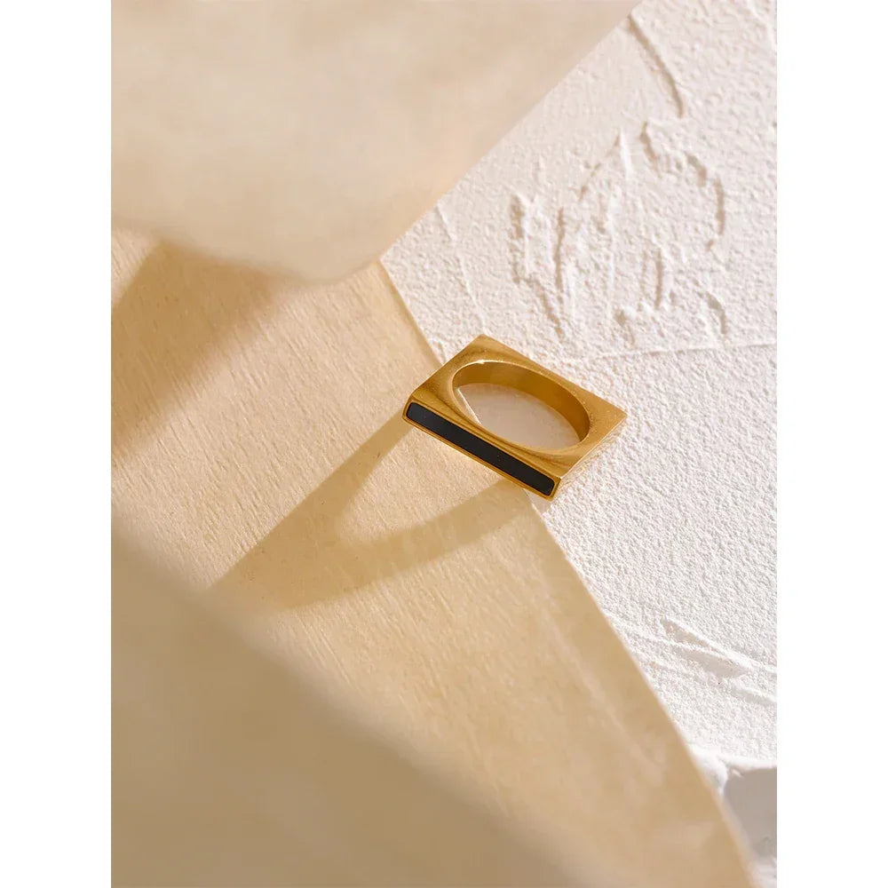 18K gold-plated square ring with black enamel detail on textured surface