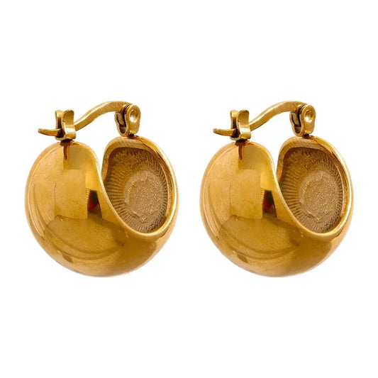 Pair of gold-plated round hoop earrings with a shiny, modern dome design on white background