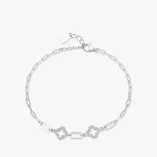 Silver bracelet with star-shaped links on a white background